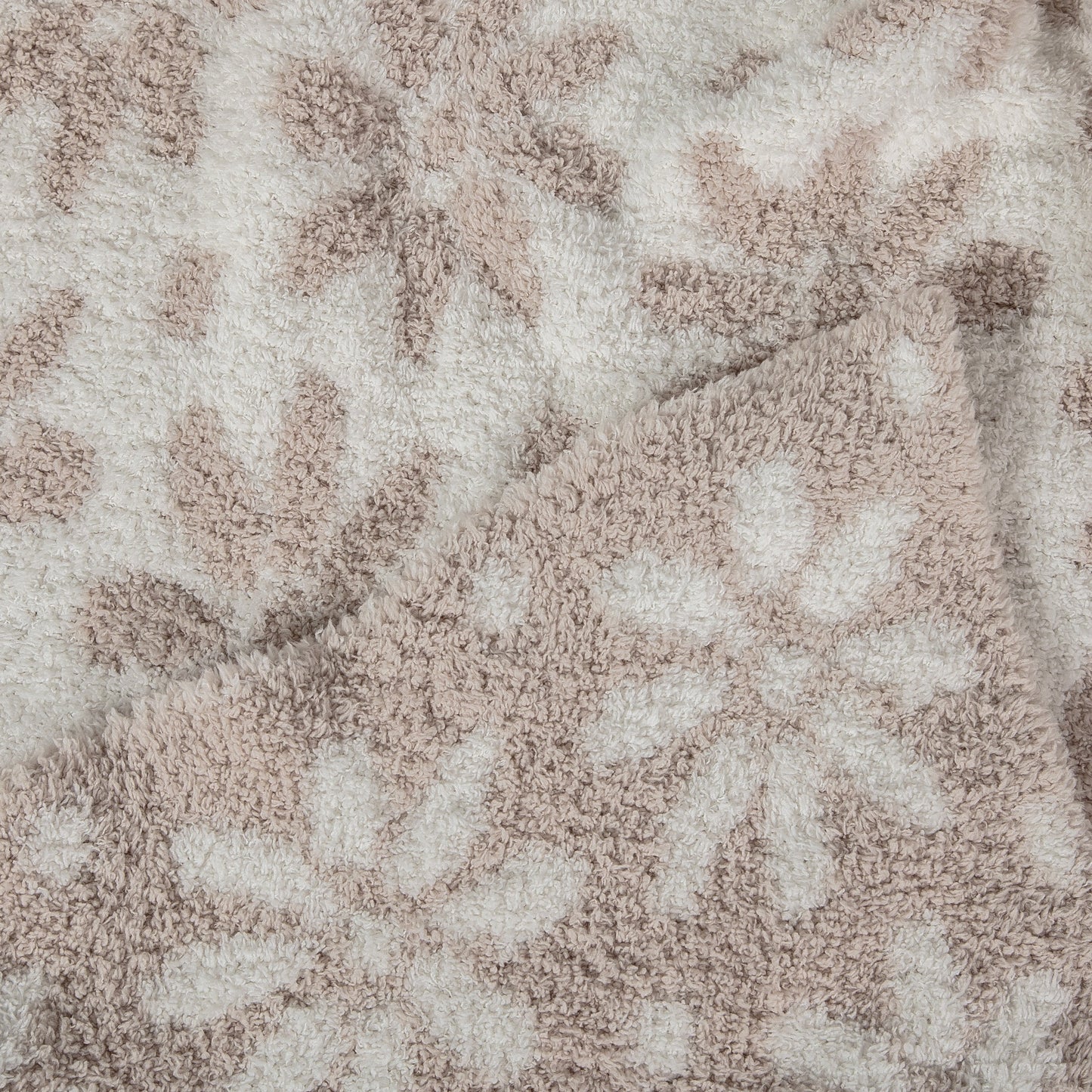 Couverture pour tout-petit à imprimé marguerites beige rosé et blanc