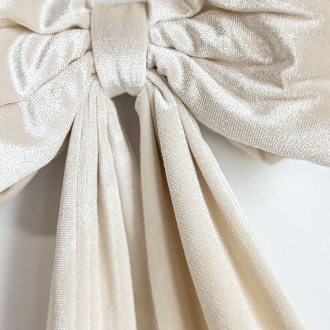 Guirlande de Noël noeuds en velours crème