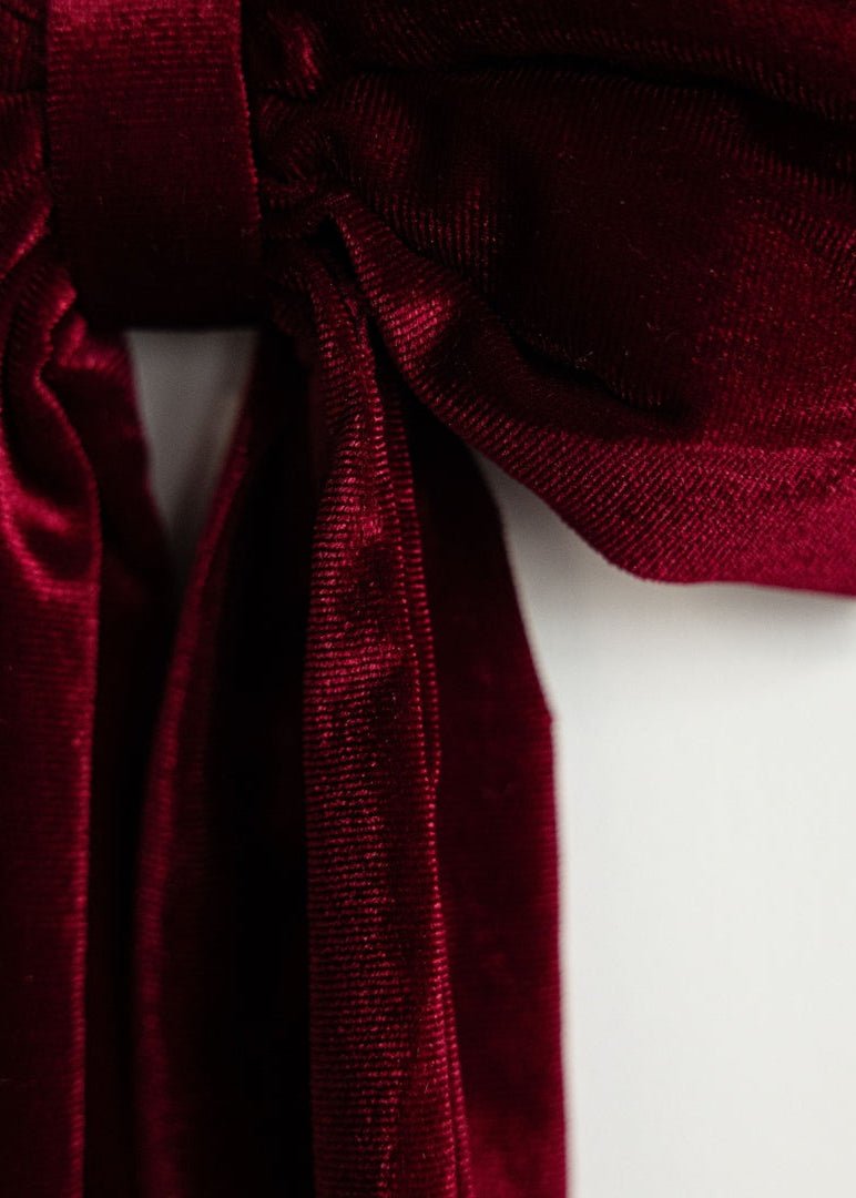 Guirlande de nœuds en velours rouge