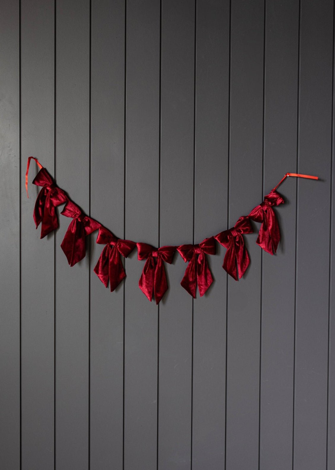 Guirlande de nœuds en velours rouge